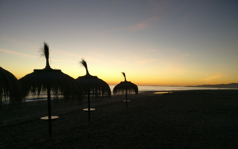 Coucher de soleil sur la plage de Poniente