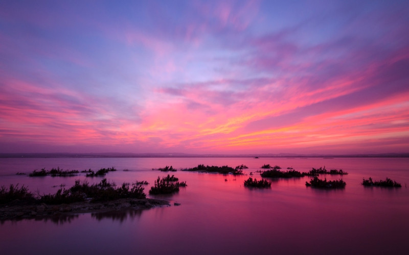 Un lieu offrant une vue panoramique unique au coucher du soleil